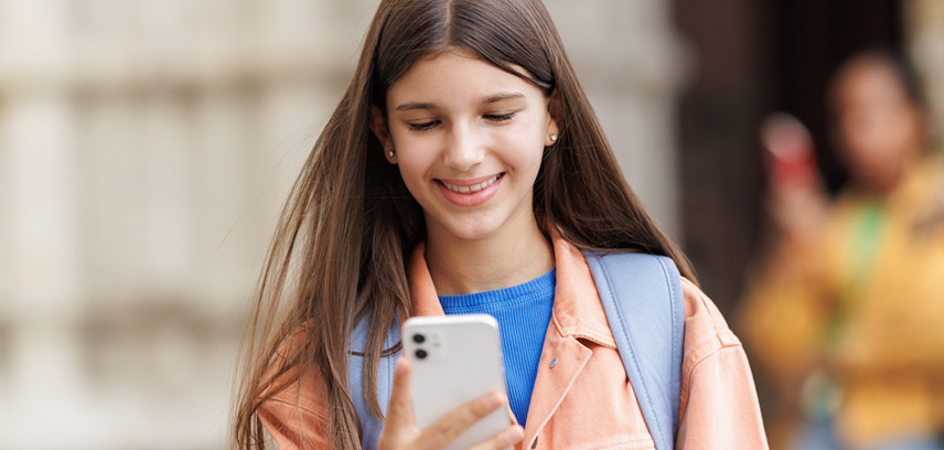 Teenage girl watching YouTube shorts