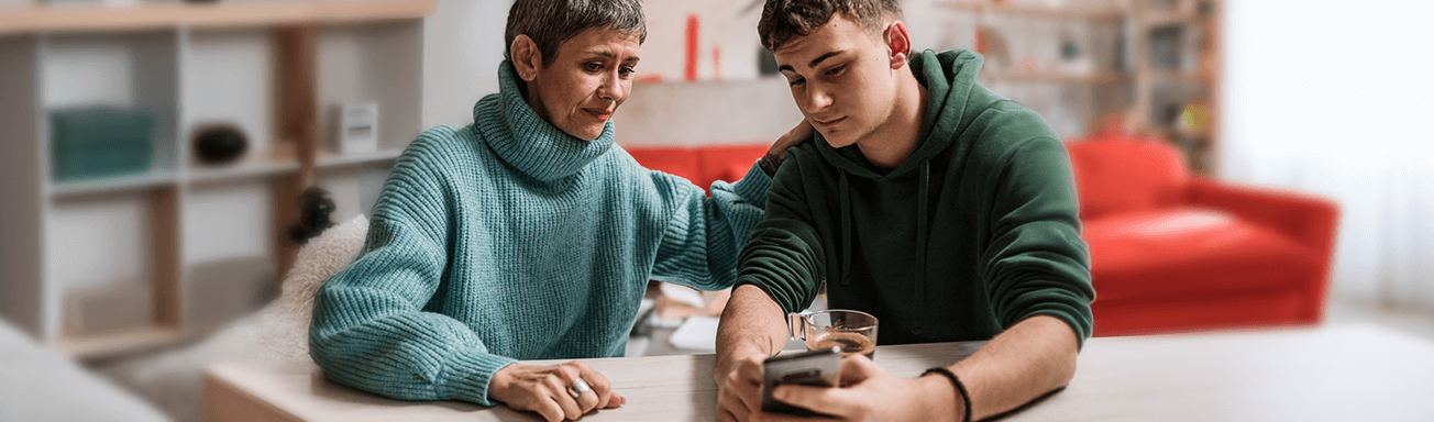 Teenager dealing with negative social media comments