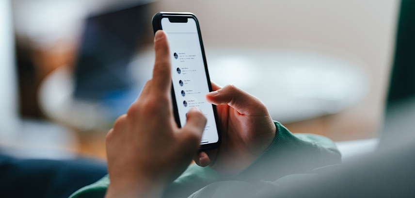 Teenage boy using smart phone