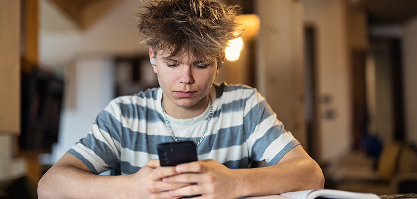 Teenage boy with smartphone