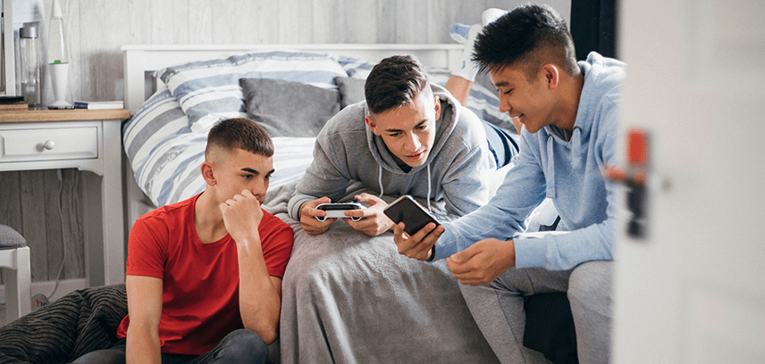 Teenage boys gambling on sports